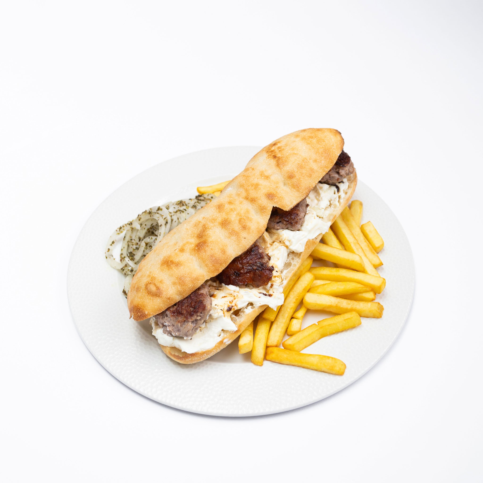 Ќебапи во селски леб “уштипци”